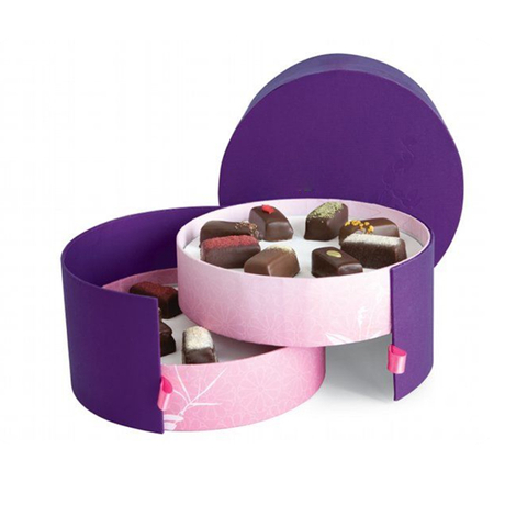 purple round chocolate packaging with ribbon.jpg