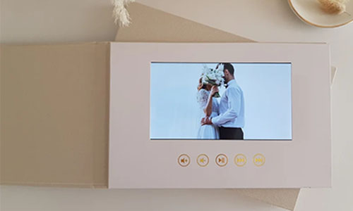 What is a wedding video book?